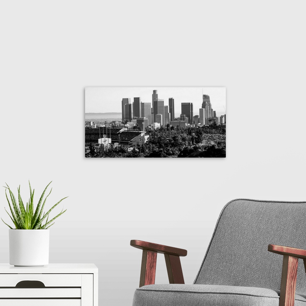 A modern room featuring Photograph of the downtown Los Angeles skyline with Dodger Stadium on the left.