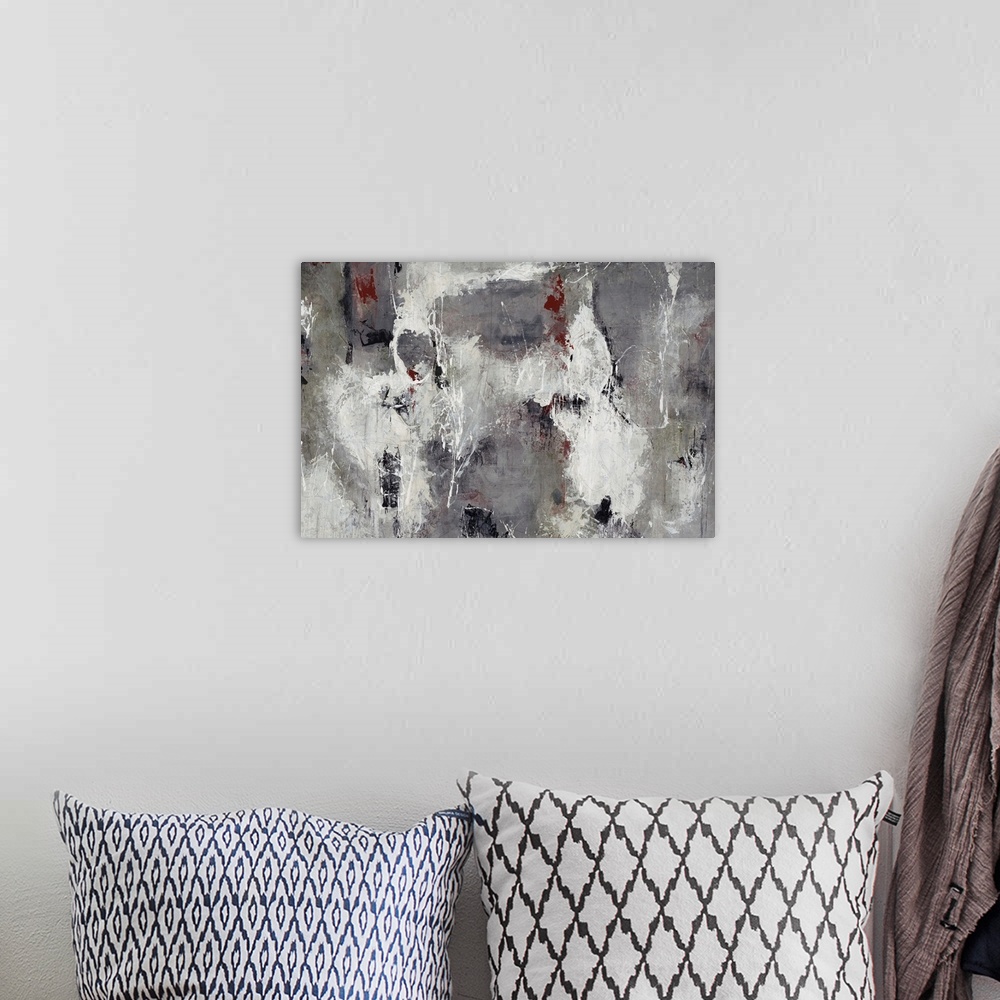 A bohemian room featuring Contemporary painting done in various cool gray tones with tiny maroon accents.