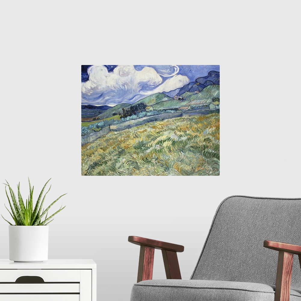 A modern room featuring Vincent van Gogh - Landscape from Saint-Remy.
