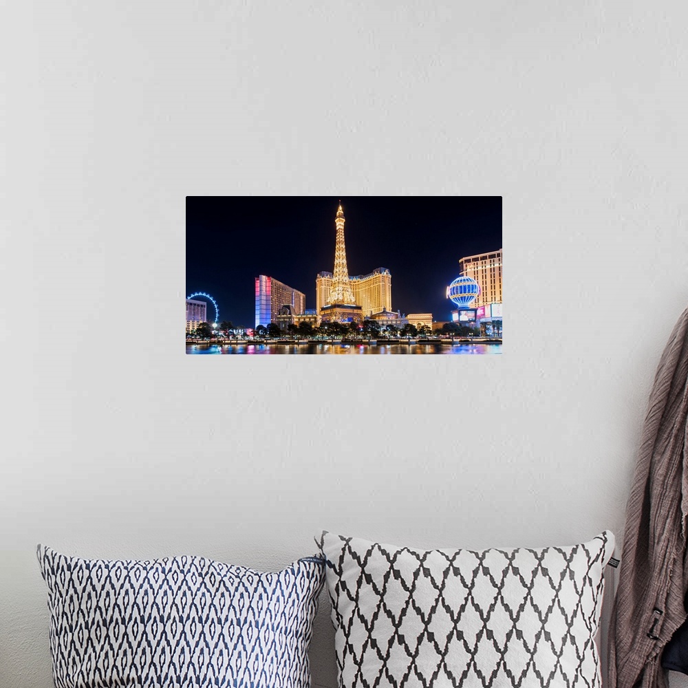 A bohemian room featuring Panoramic photograph of the Las Vegas Strip lit up at night highlighting the Eiffel Tower Restaur...