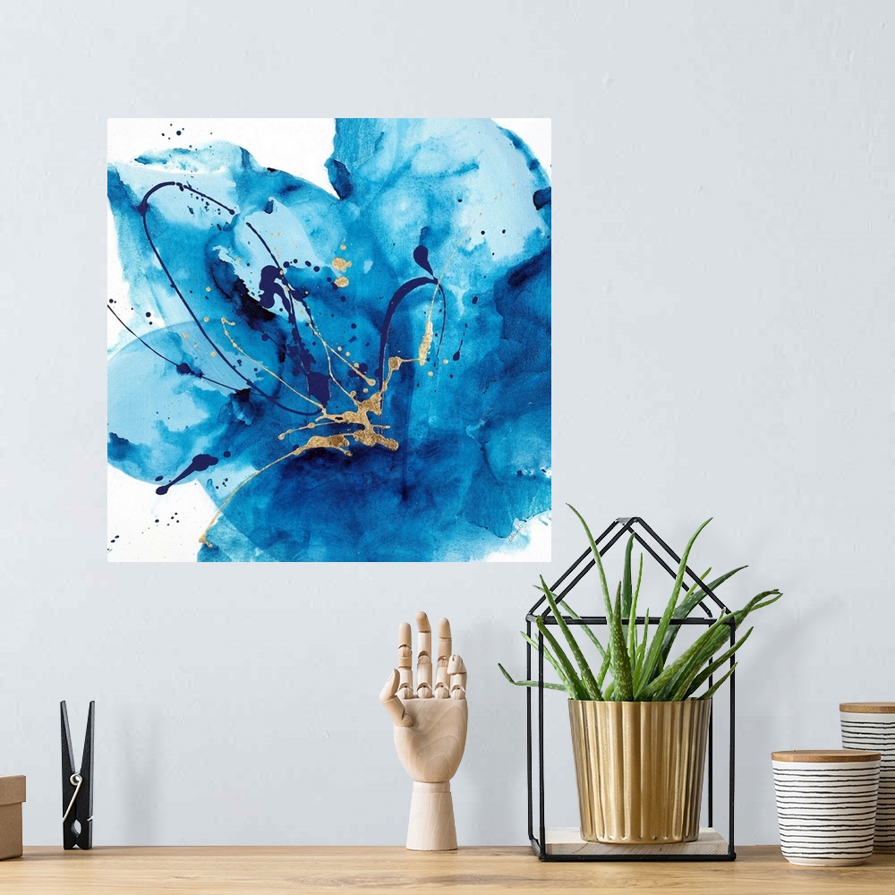 A bohemian room featuring Contemporary abstract painting using a splash of vibrant blue against a white background.
