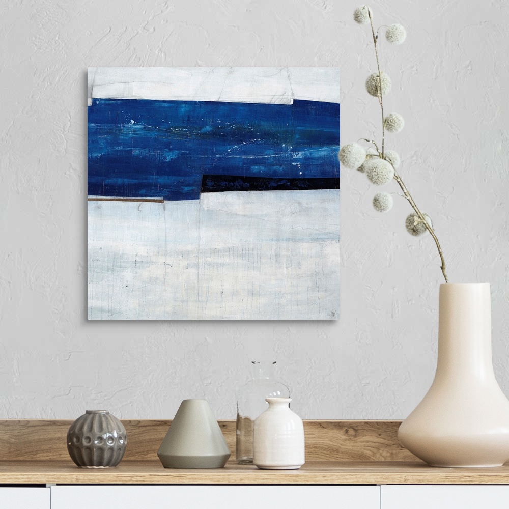 A farmhouse room featuring Abstract painting of a navy blue strip over a cool, gray-blue background.