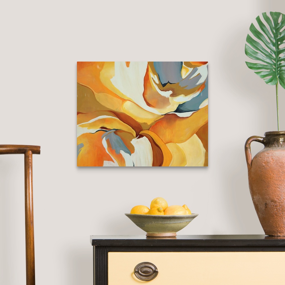 A traditional room featuring Bright abstract painting of fluid forms in varying shades of yellow, from lemon to mustard.