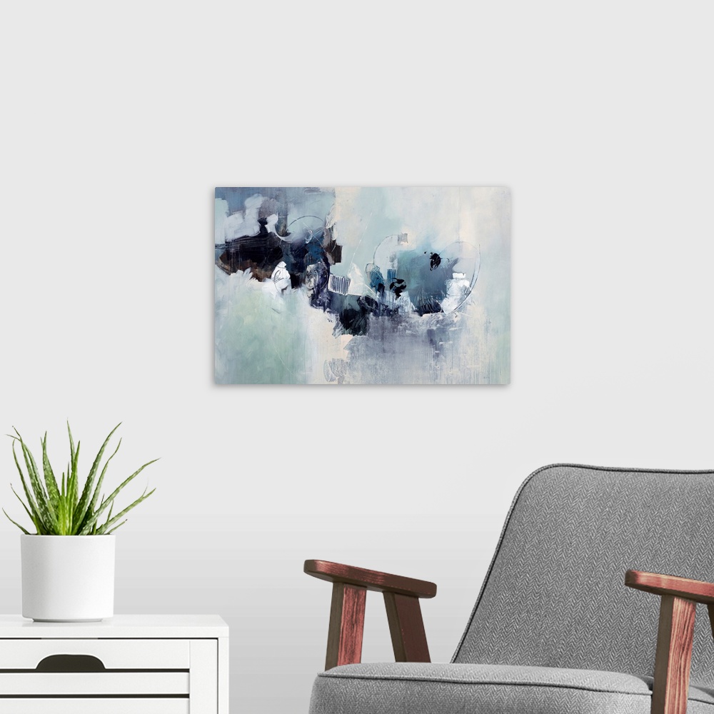 A modern room featuring Abstract painting of a cluster of random shapes and cool neutral tones that appear to breaking th...