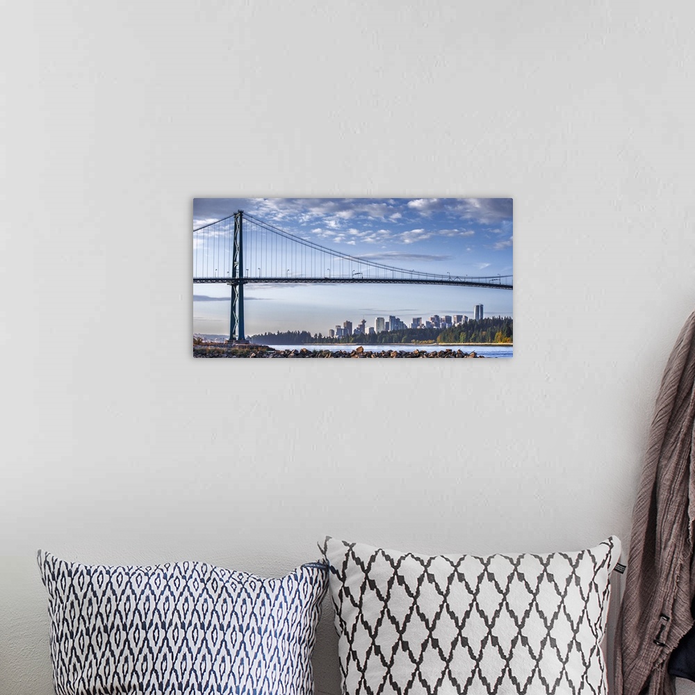 A bohemian room featuring Photograph of Lion's Gate Bridge over the Burrard Inlet with the Vancouver, BC, Canada skyline in...