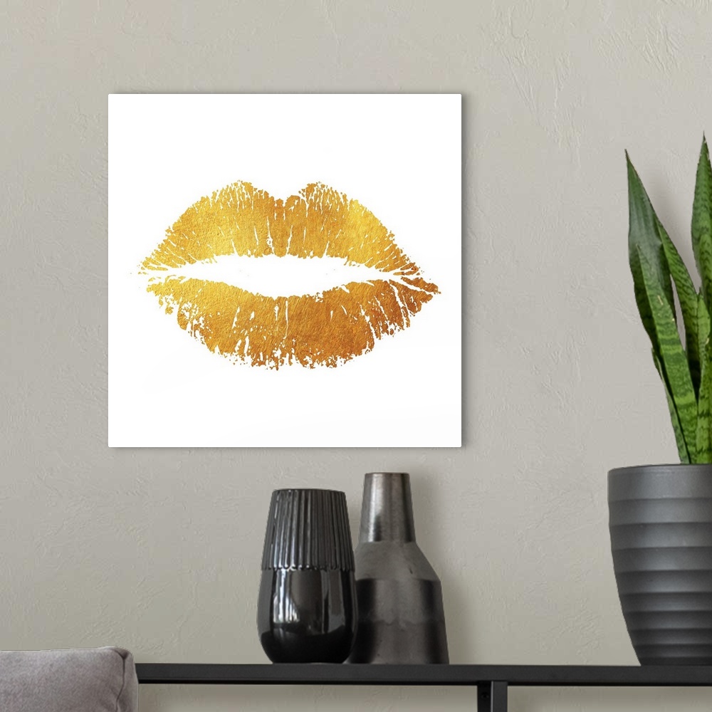 A modern room featuring A simple yet striking image of a lip print in a bright, vibrant gold tone.