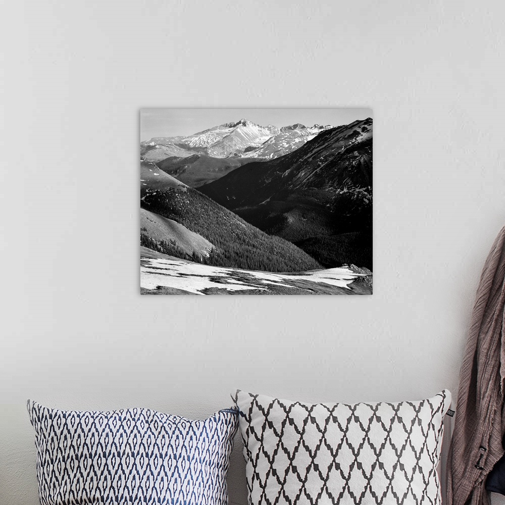 A bohemian room featuring Long's Peak, Rocky Mountain National Park, close in panorama, dark shadowed hills in foreground, ...