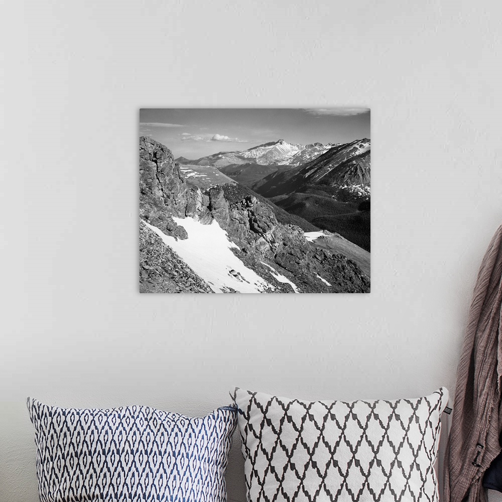 A bohemian room featuring Long's Peak, Rocky Mountain National Park, panorama of barren mountains with snow.