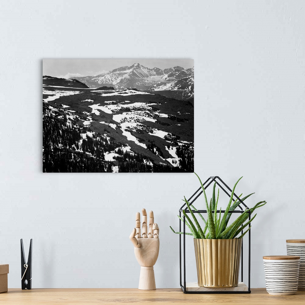 A bohemian room featuring Long's Peak, Rocky Mountain National Park, panorama of plateau, snow covered mountain in background.