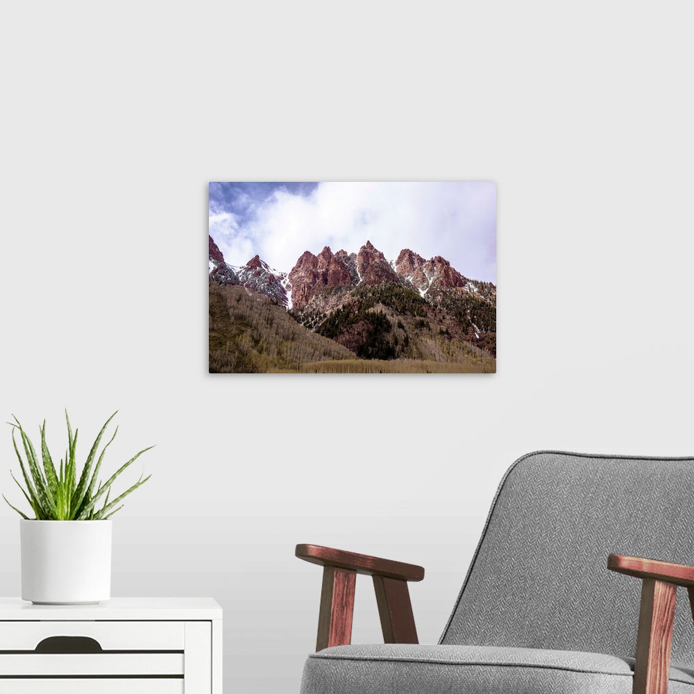 A modern room featuring Photo of majestic mountain peaks with fragments of snow in Colorado.