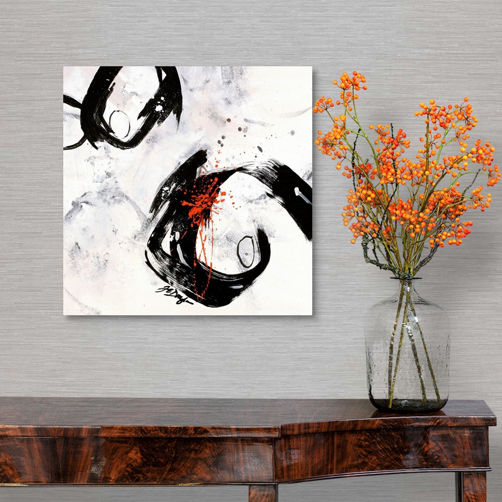 A traditional room featuring Contemporary abstract painting of two boldly colored circles surrounded by paint smudges and cove...