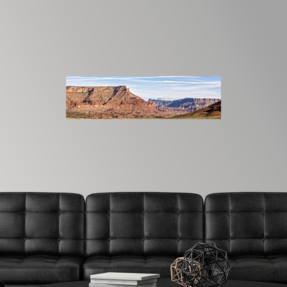 A modern room featuring Red rock cliffs in the desert landscape of Salt Valley in Arches National Park, Moab, Utah.