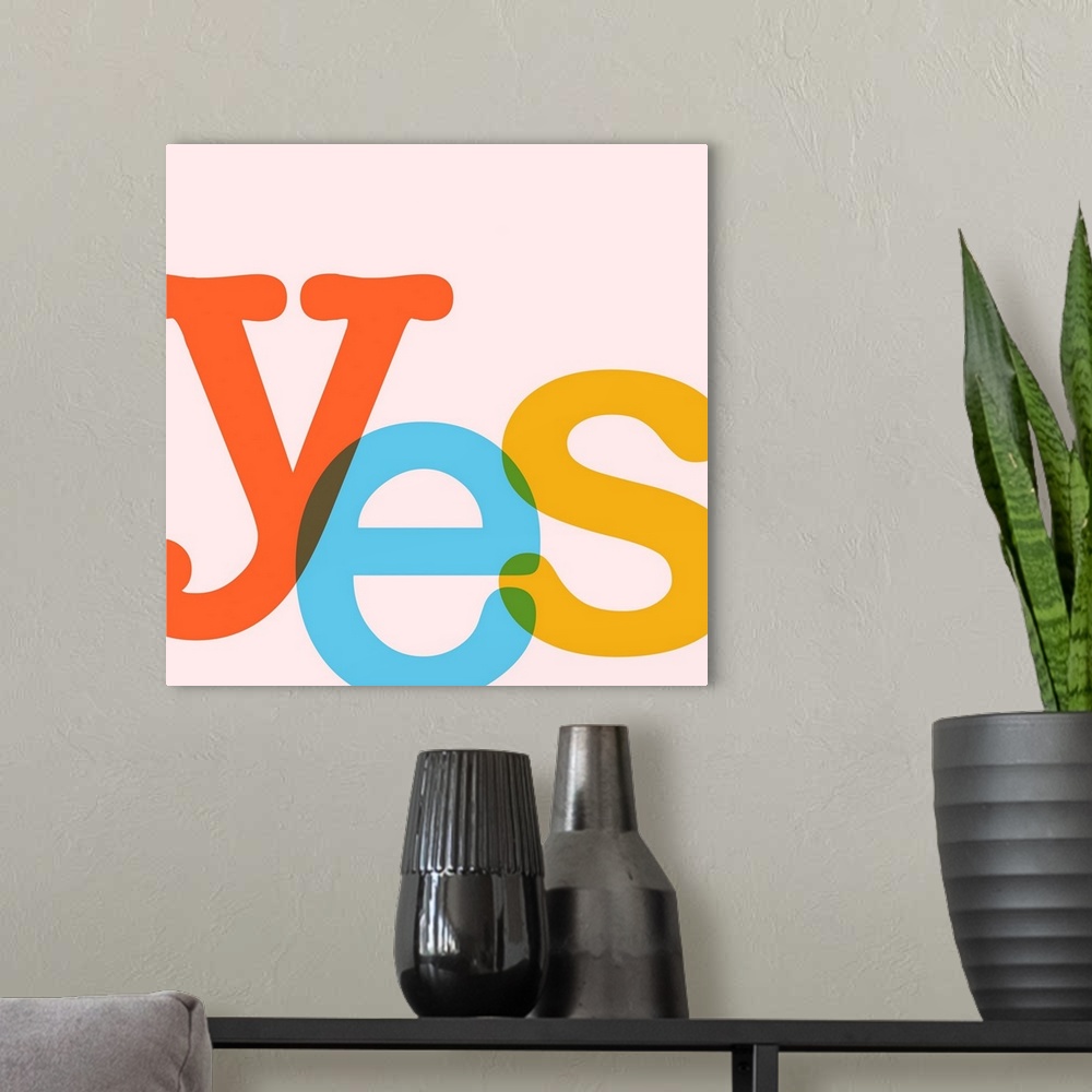 A modern room featuring A square modern illustration of the word YES in bright colors.