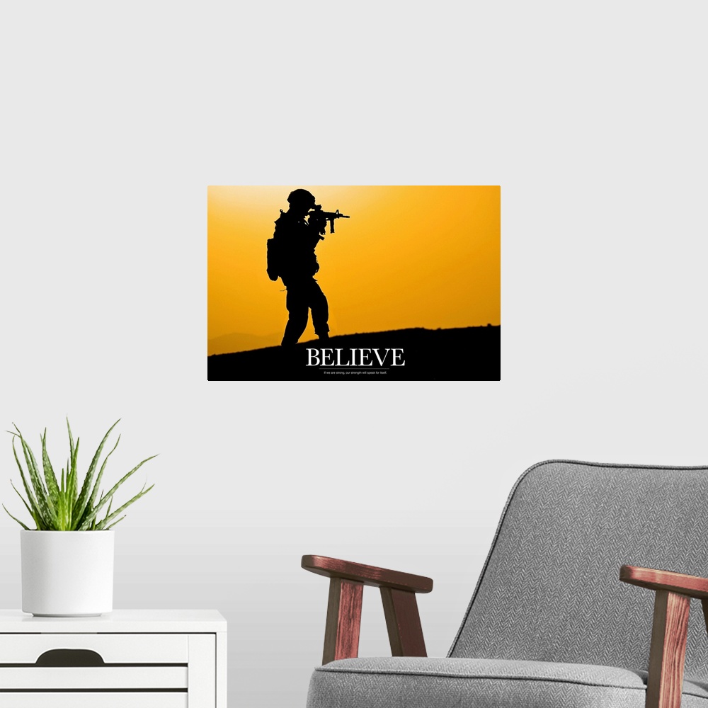A modern room featuring This piece shows a silhouette of a solider holding his gun with the word "Believe" written below ...