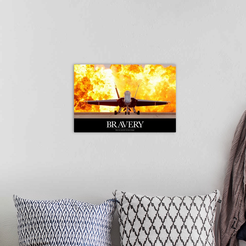 A bohemian room featuring Military poster of a picture taken straight on of an aircraft that has a fiery explosion behind i...