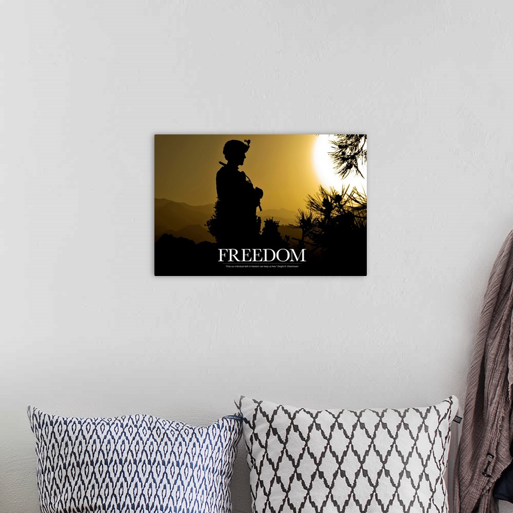 A bohemian room featuring Inspirational artwork for freedom showing the silhouette of a standing soldier created by the set...