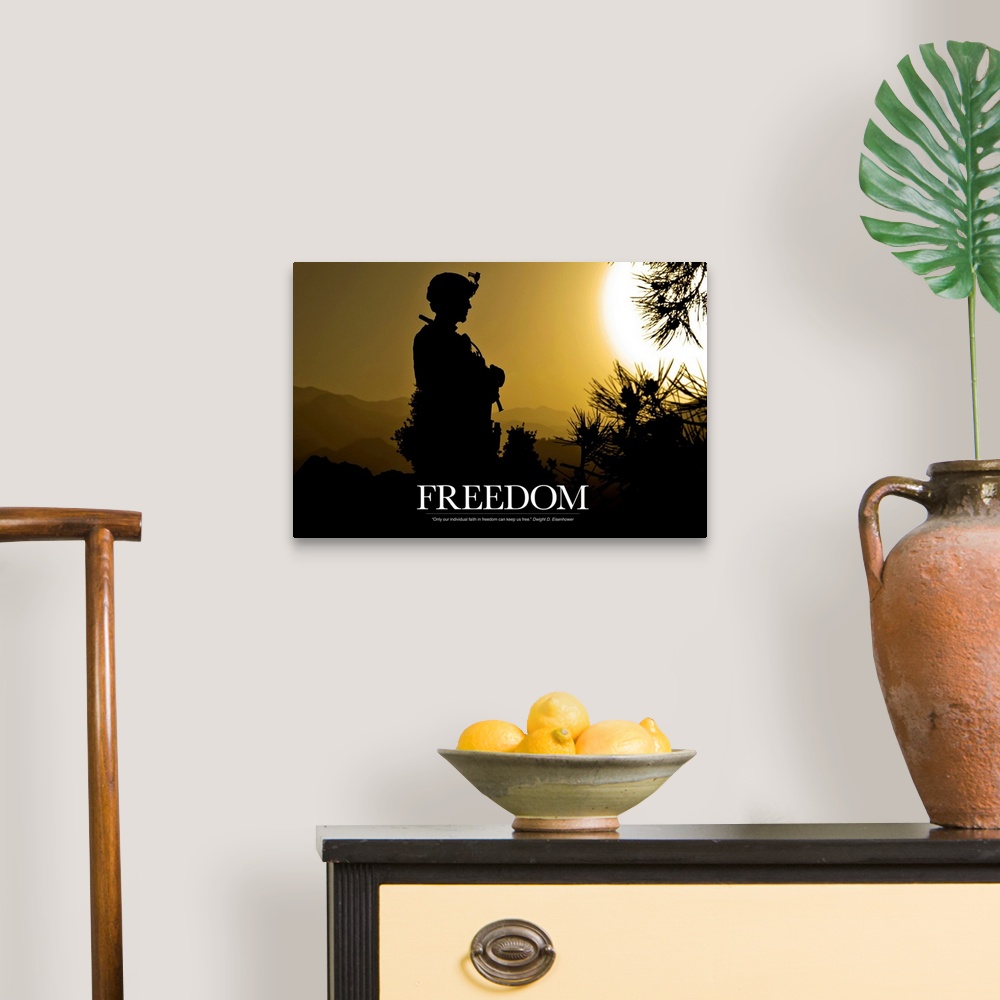 A traditional room featuring Inspirational artwork for freedom showing the silhouette of a standing soldier created by the set...