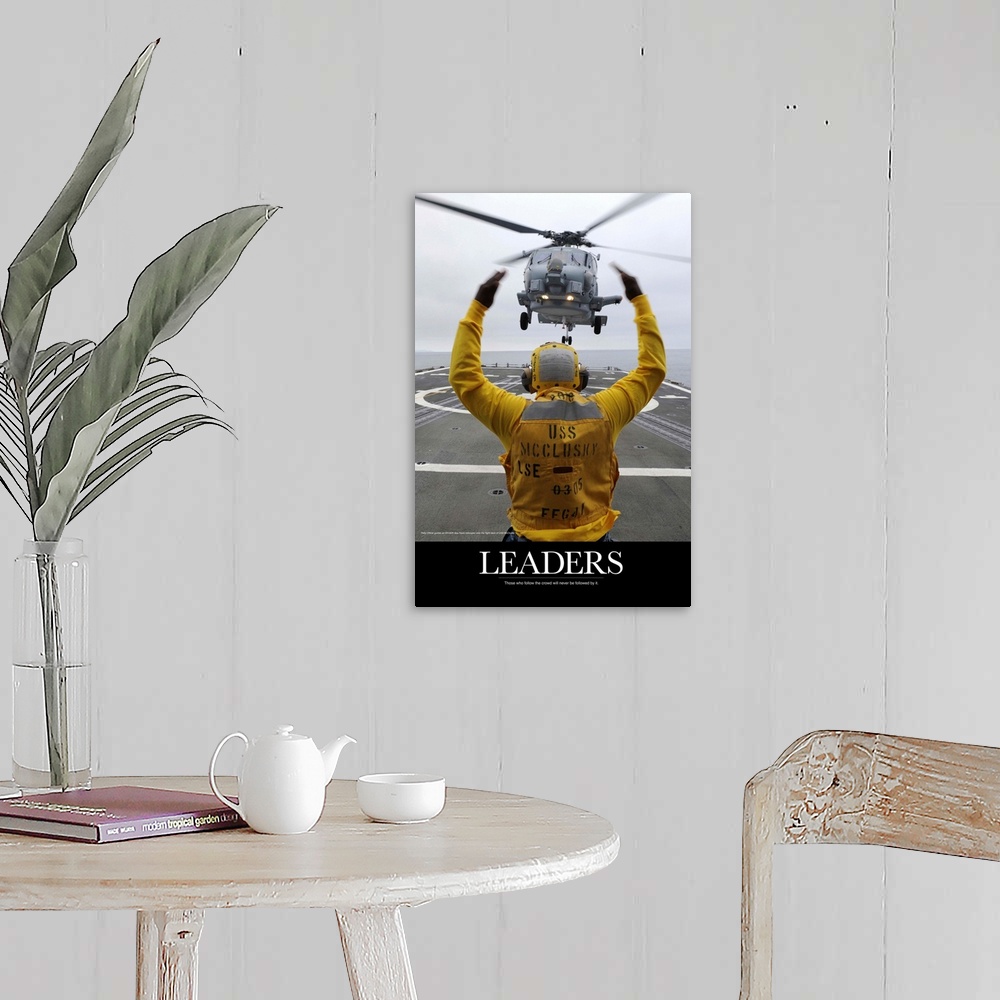 A farmhouse room featuring Military Poster: Petty Officer guides an SH-60R Sea Hawk helicopter