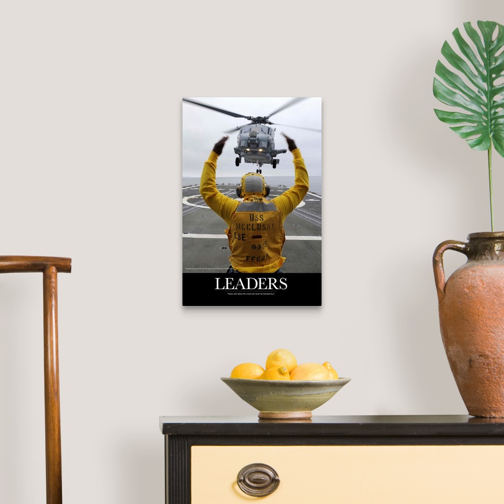 A traditional room featuring Military Poster: Petty Officer guides an SH-60R Sea Hawk helicopter