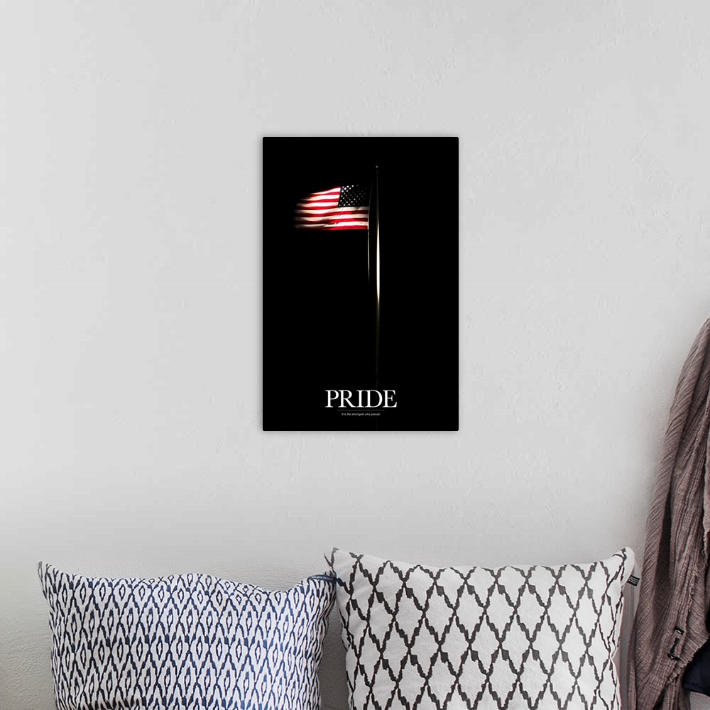 A bohemian room featuring A big vertical canvas of an American flag on a pole waving in the wind highlighted against a dark...
