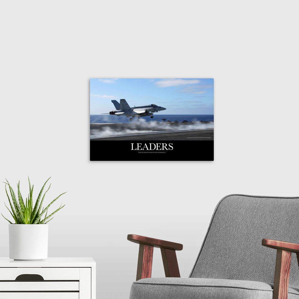 A modern room featuring Motivational Poster: An F/A-18E Super Hornet catapults from an aircraft carrier