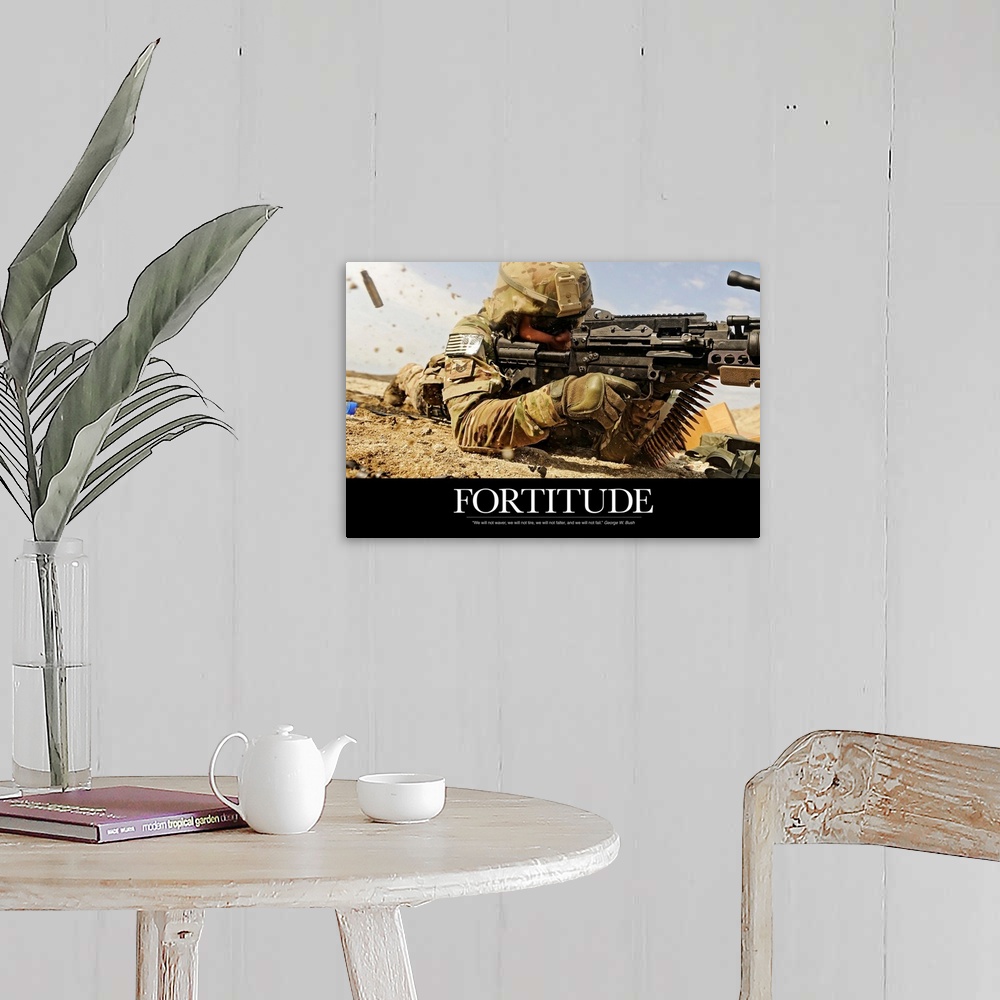 A farmhouse room featuring Inspirational poster with the image of a soldier on the ground shooting a gun with shells flying ...