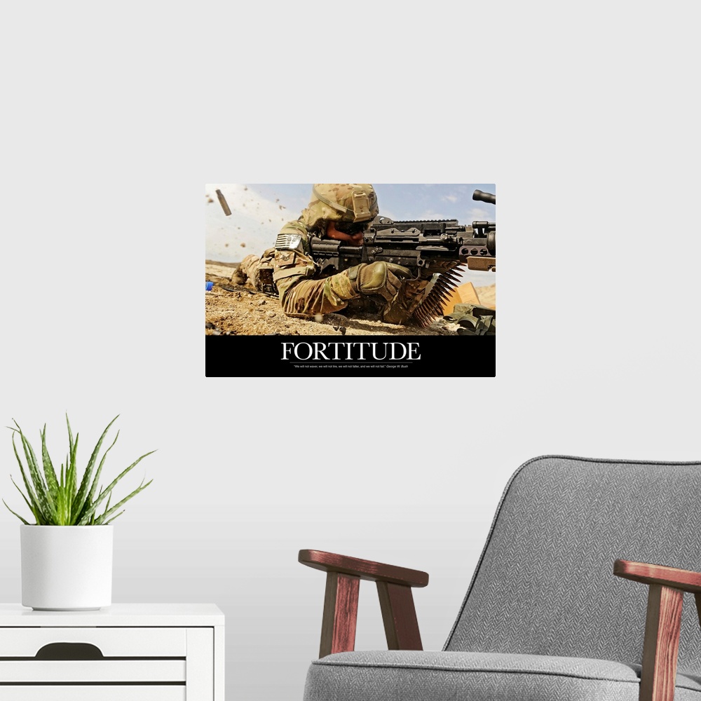 A modern room featuring Inspirational poster with the image of a soldier on the ground shooting a gun with shells flying ...
