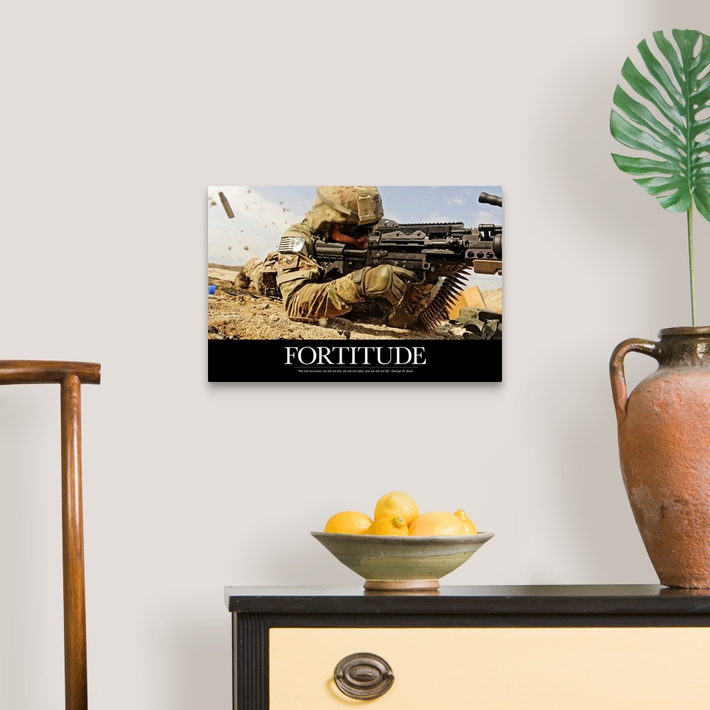 A traditional room featuring Inspirational poster with the image of a soldier on the ground shooting a gun with shells flying ...