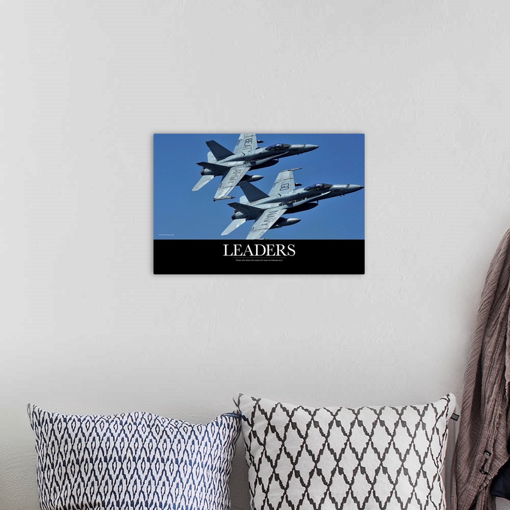 A bohemian room featuring Motivational Poster: Two F/A-18C Hornets in flight