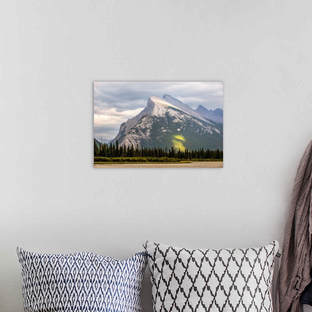 A bohemian room featuring Mount Rundle in Banff National Park, Alberta, Canada.