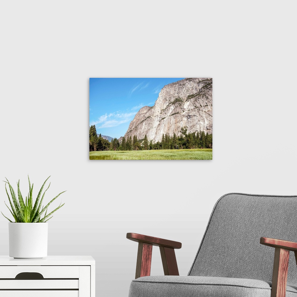 A modern room featuring View of Mountain landscape from valley floor in Yosemite National Park, California.