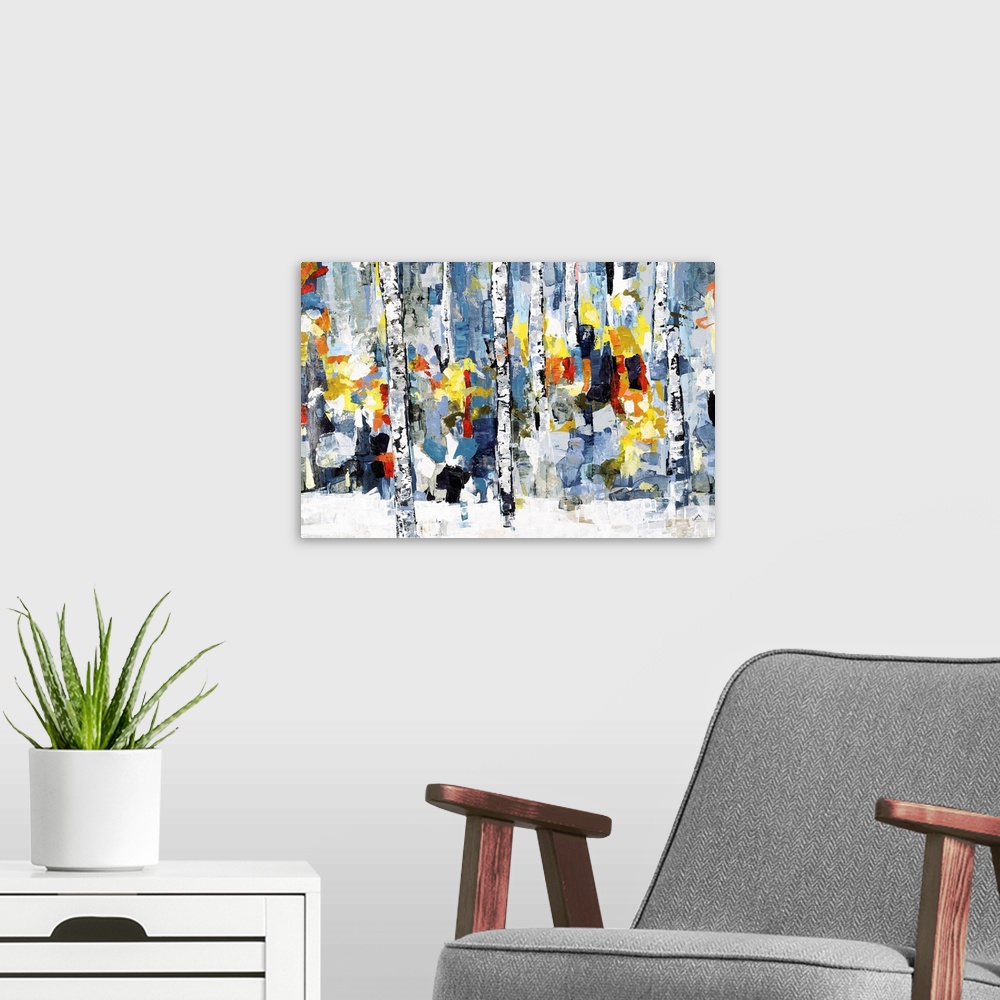 A modern room featuring Horizontal abstract painting of a wooded forest with colorful fall leaves.