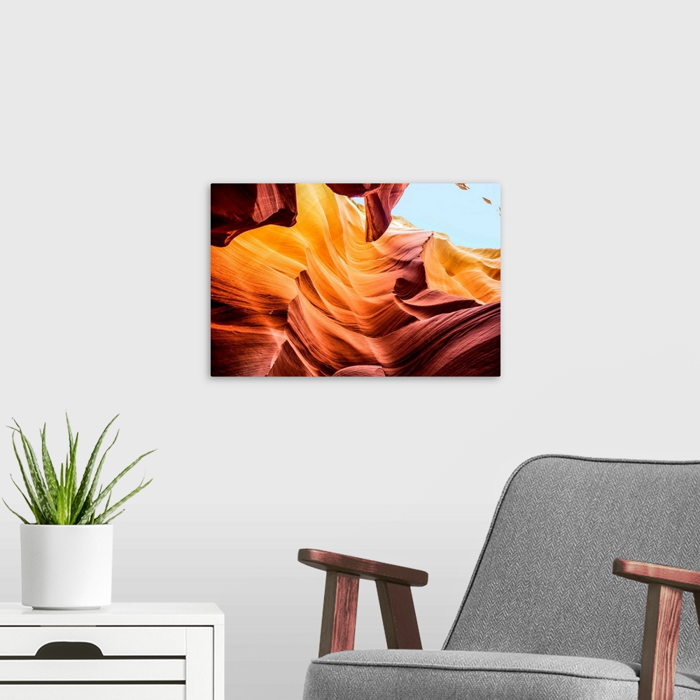 A modern room featuring Photo from inside of Antelope Canyon rock formation located on the Navajo Reservation in Page, Ar...