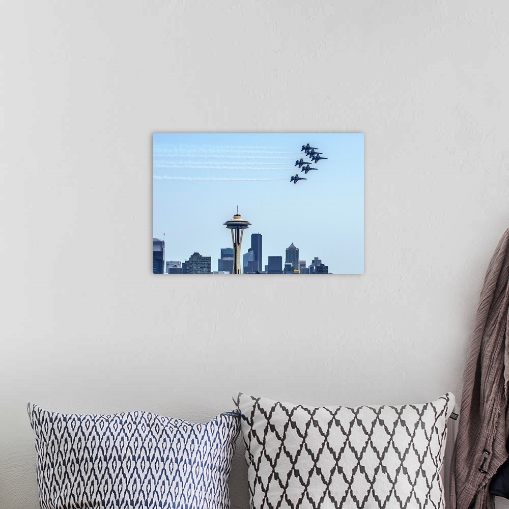 A bohemian room featuring Photograph of 6 Navy jets flying over the Seattle skyline with the Space Needle in the center.
