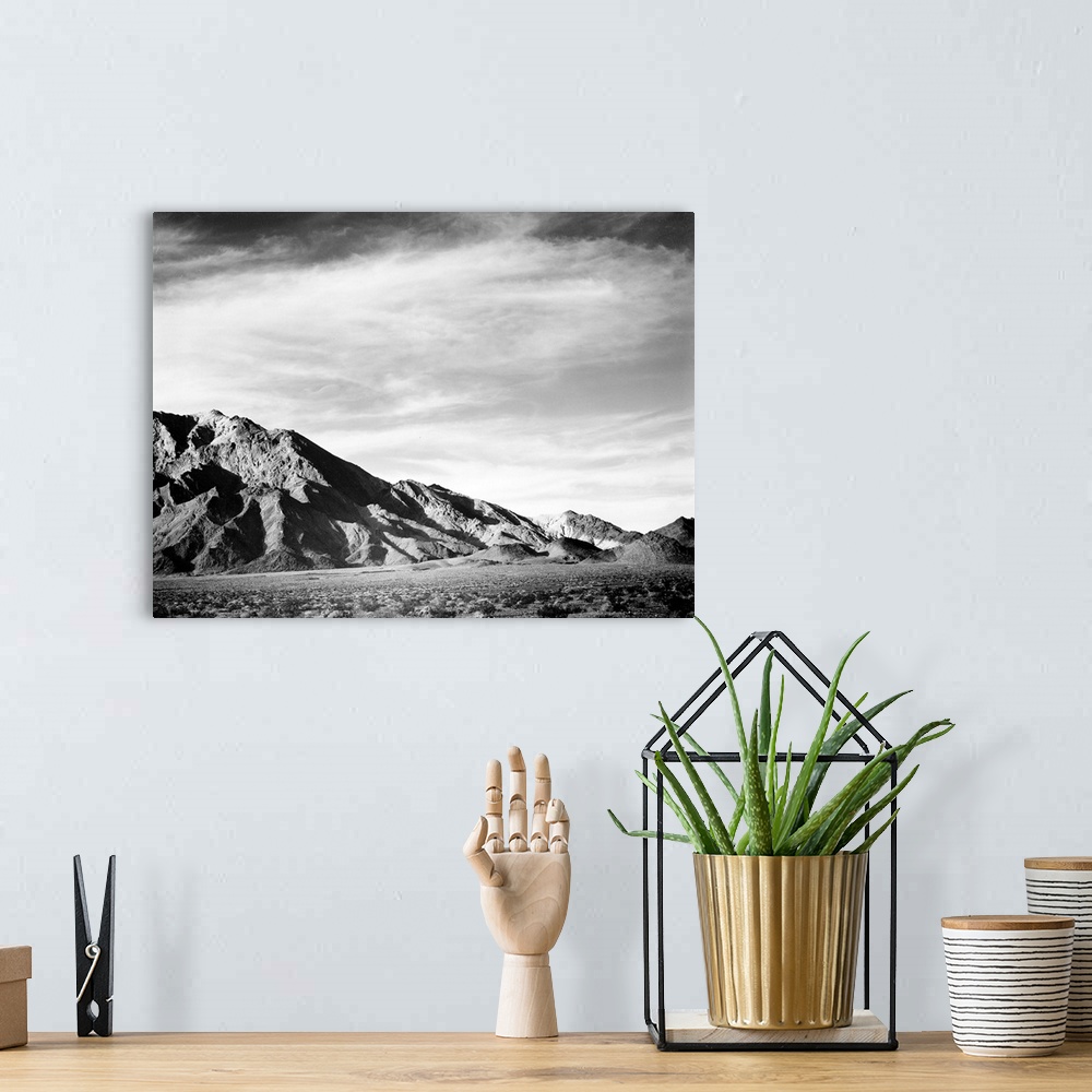 A bohemian room featuring Near Death Valley, panorama of mountains.