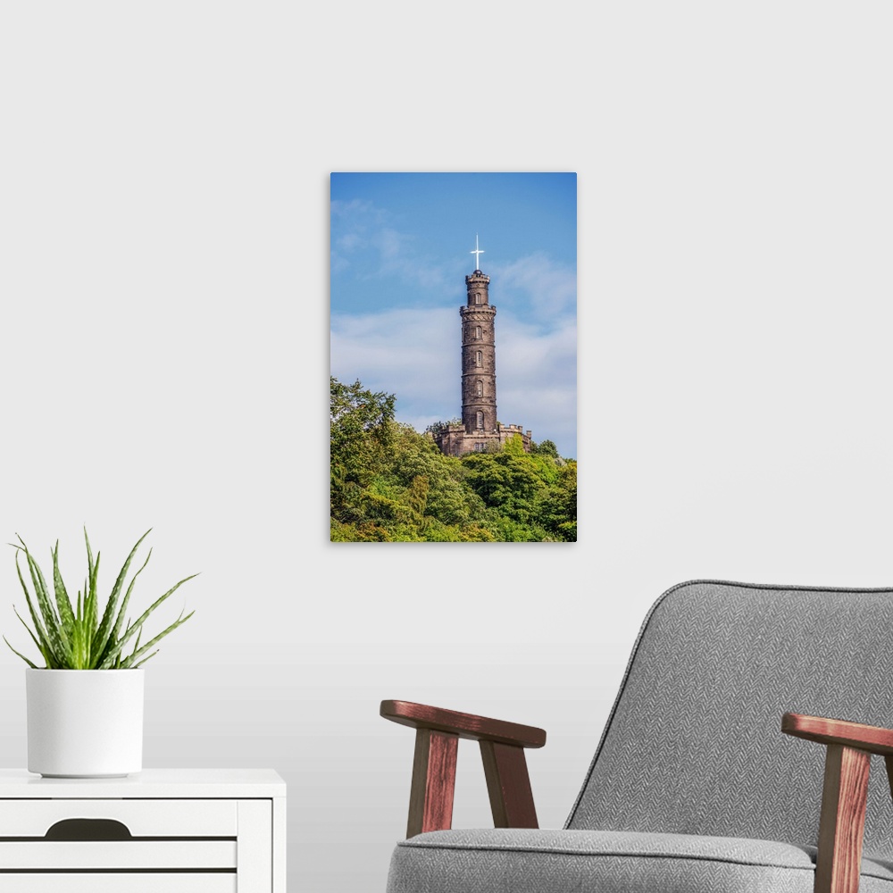 A modern room featuring The Nelson Monument sits atop Calton Hill and is a commemorative tower in honor of Vice Admiral H...
