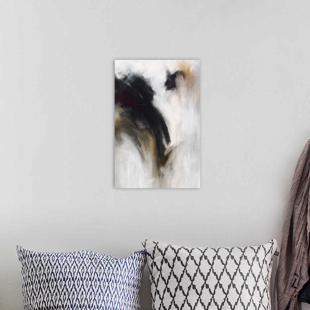 A bohemian room featuring Vertical abstract painting with dark black over bright grey.