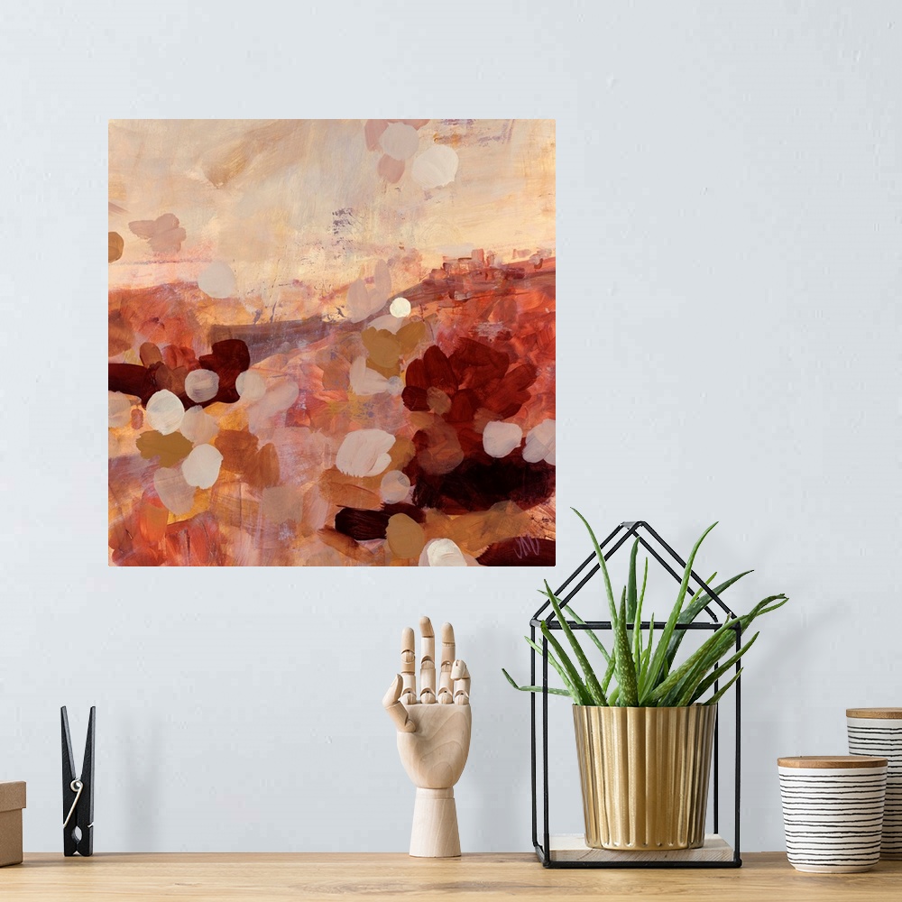 A bohemian room featuring Earth tone abstract painting of layered paint daubs on top of wide brush strokes.