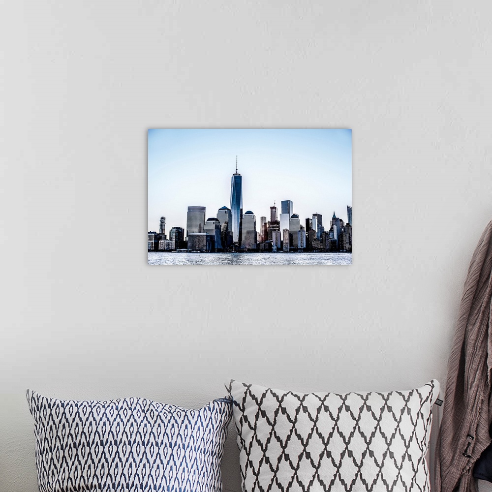 A bohemian room featuring View of the New York City skyline from across the Hudson River.