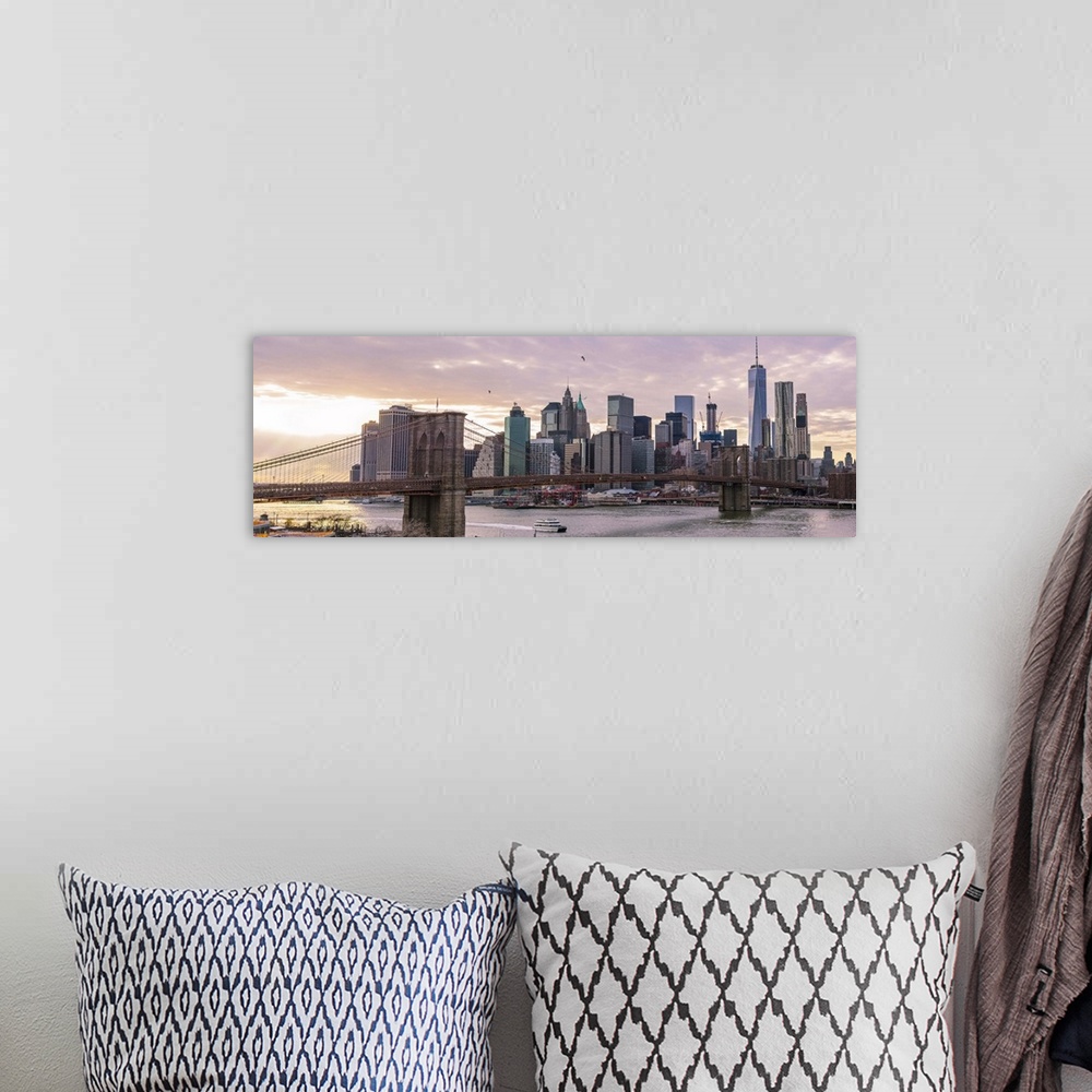 A bohemian room featuring The Brooklyn Bridge and New York City Skyline, New York, seen in the morning.