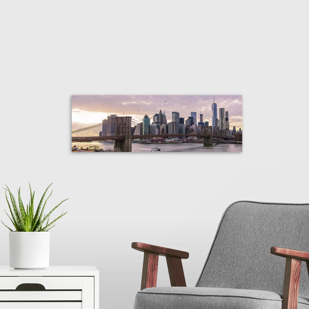 A modern room featuring The Brooklyn Bridge and New York City Skyline, New York, seen in the morning.