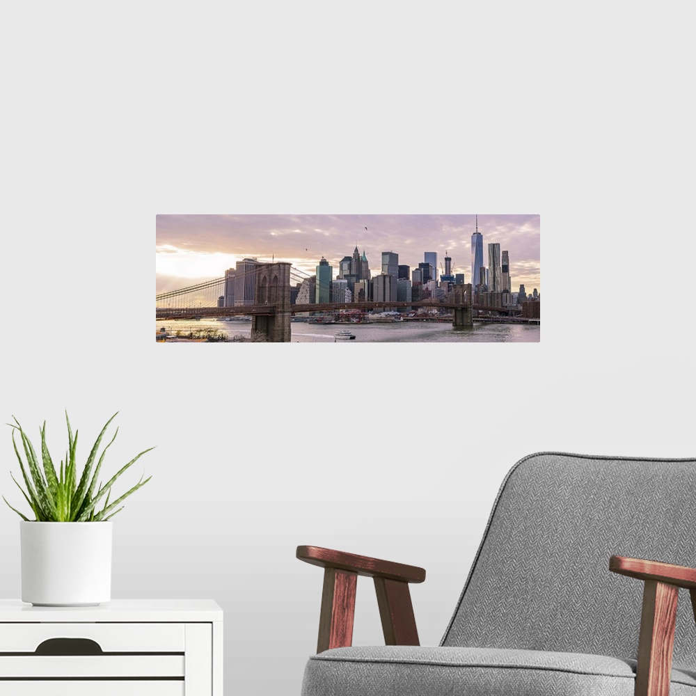 A modern room featuring The Brooklyn Bridge and New York City Skyline, New York, seen in the morning.