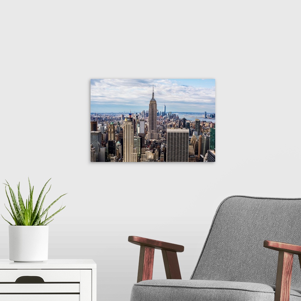 A modern room featuring View of the Empire State Building located in New York City, New York.