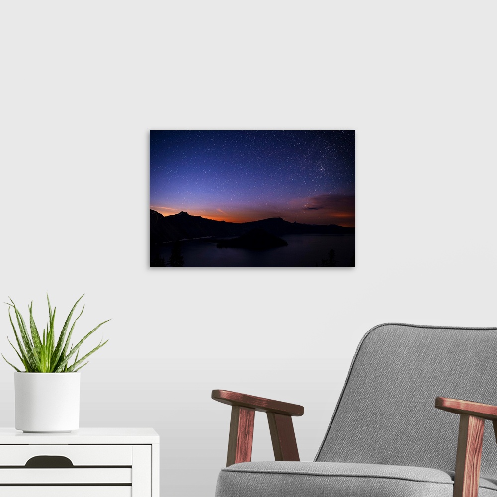 A modern room featuring View of the night sky at Crater Lake, Oregon.