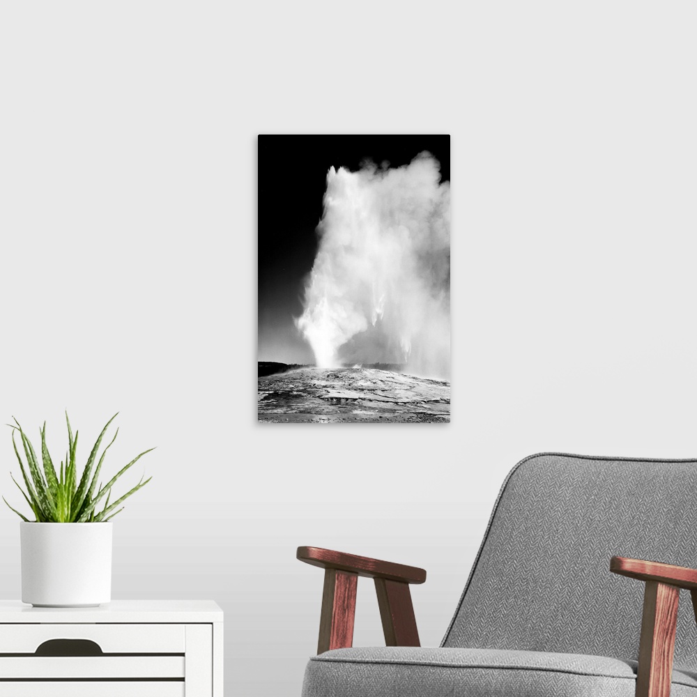 A modern room featuring Old Faithful Geyser, Yellowstone National Park, taken at dusk dawn from various angles during eru...