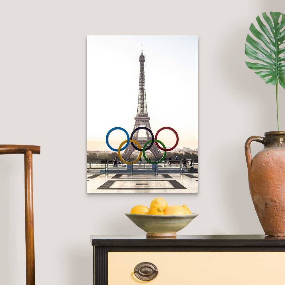 A traditional room featuring Photograph of the Eiffel Tower at sunset with the Olympic Rings in front.