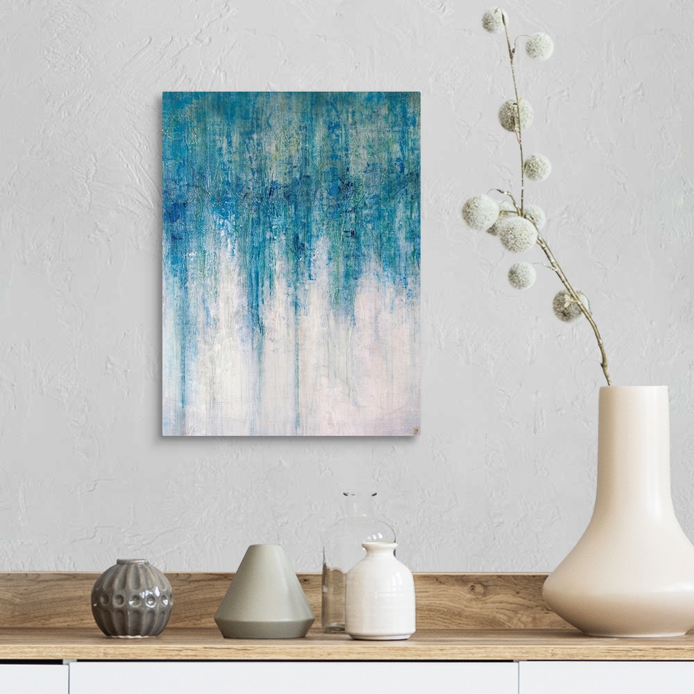 A farmhouse room featuring Abstract artwork that has shades of blue color at the top that drip down toward the bottom which ...