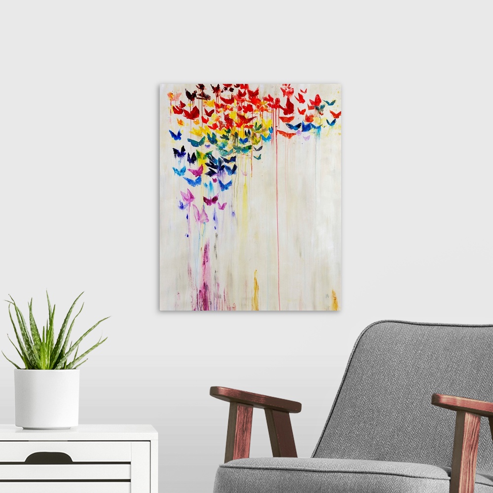A modern room featuring A rainbow of dripping painted butterflies against a white background.