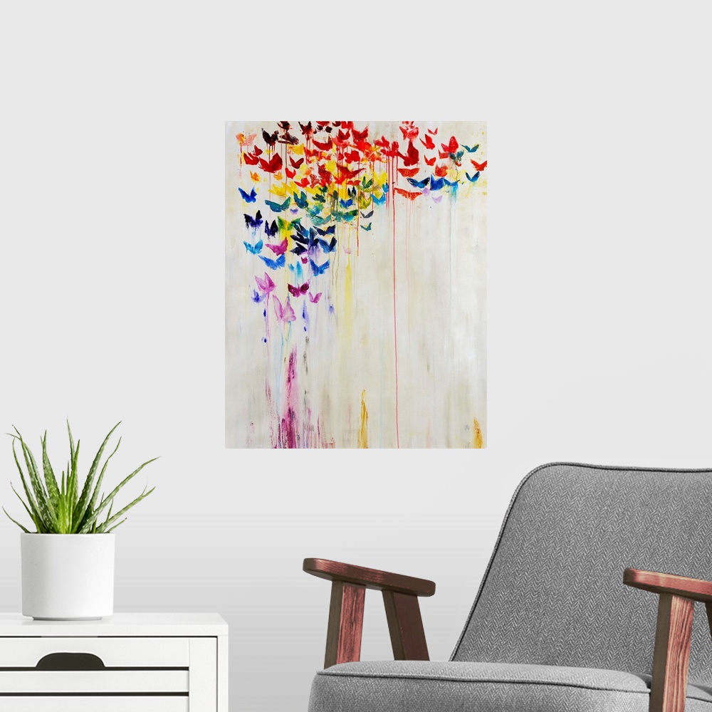 A modern room featuring A rainbow of dripping painted butterflies against a white background.