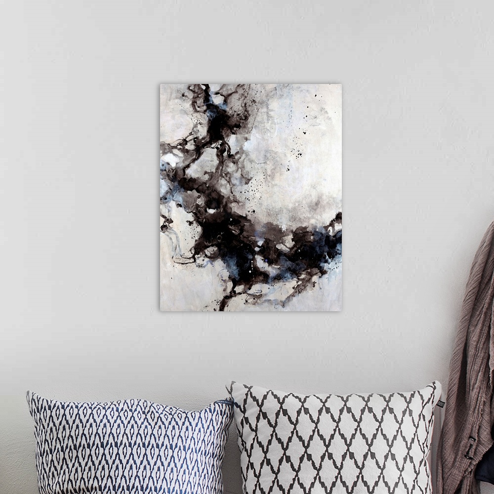 A bohemian room featuring Abstract painting of blended ink splats and splatter with a soft pastel background.